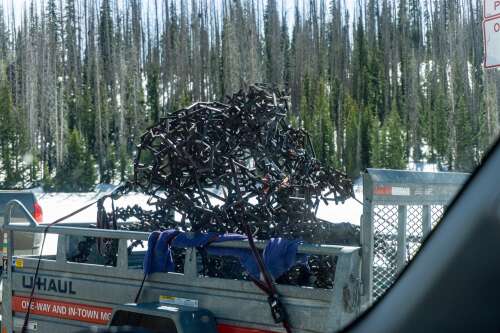 Durango sculpture being repaired by original artist