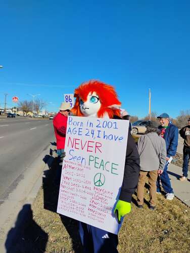 Local groups unite to protest U.S. military actions in Venezuela