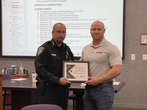 Aztec Police Department honors man who pulled woman from drainage ditch ...