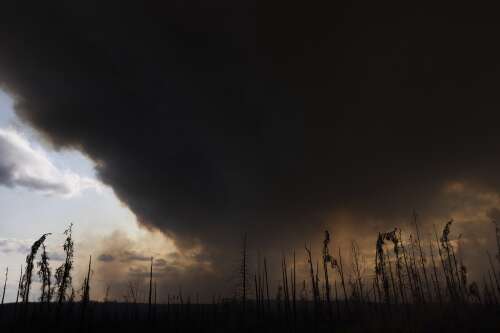 Thousands evacuated as Canadian wildfires threaten air quality