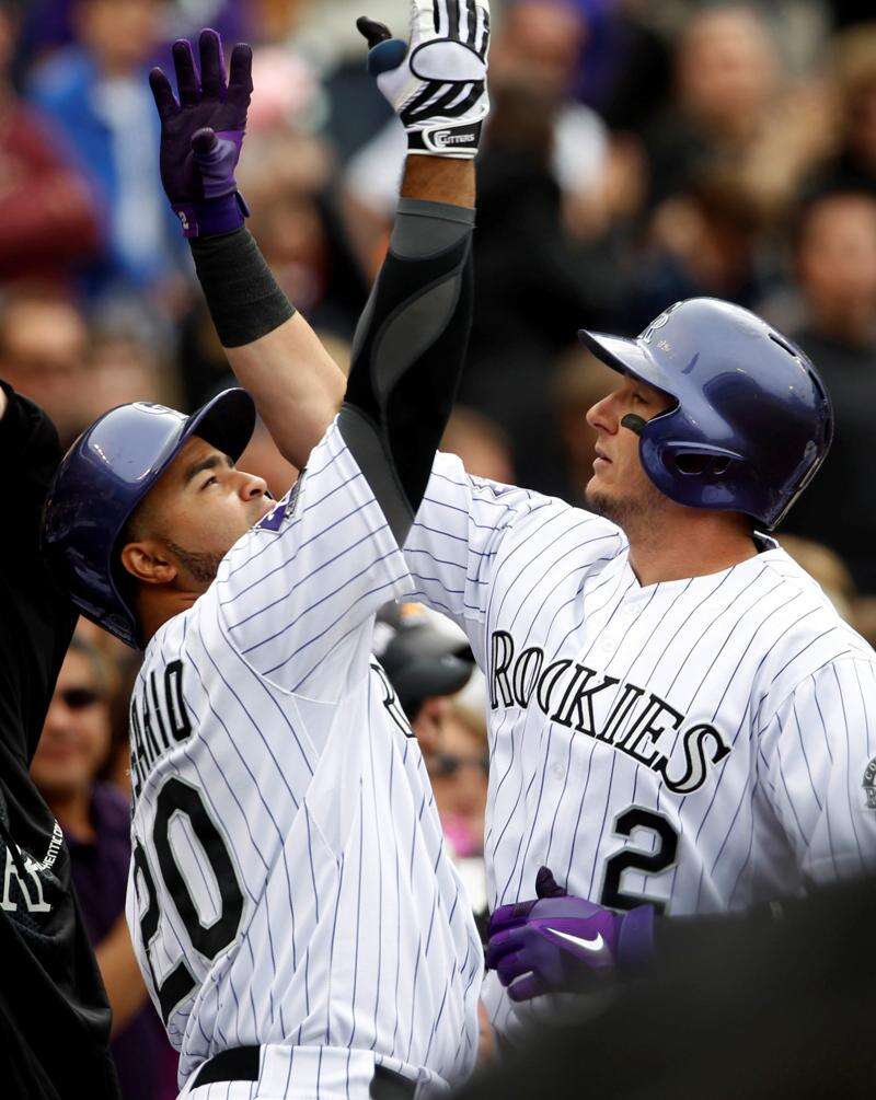 Surgery to end Todd Helton's season, plans on playing in 2013