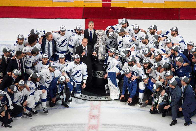 Tampa Bay Lightning fans gather around Amalie Arena to cheer in person