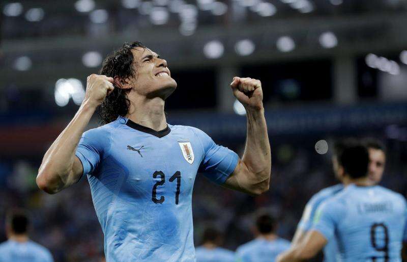 World Cup Edinson Cavani scores twice Uruguay ousts Ronaldo and