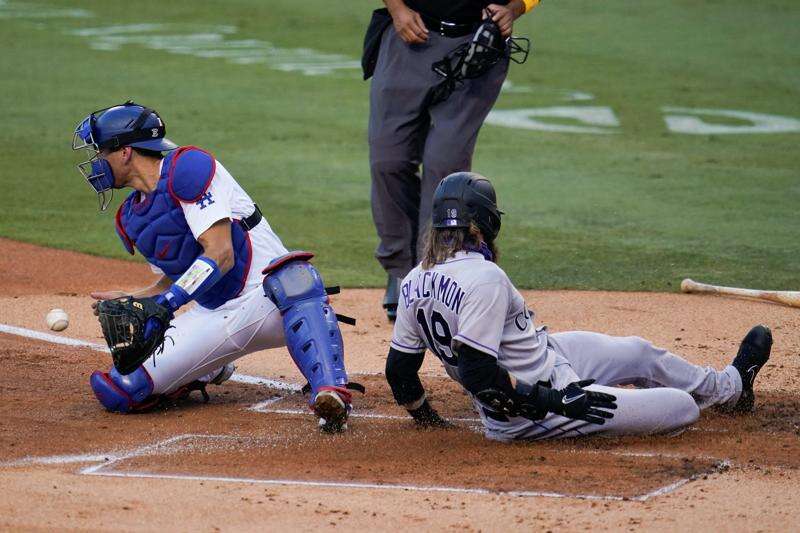 Rockies use clutch hitting to down Dodgers