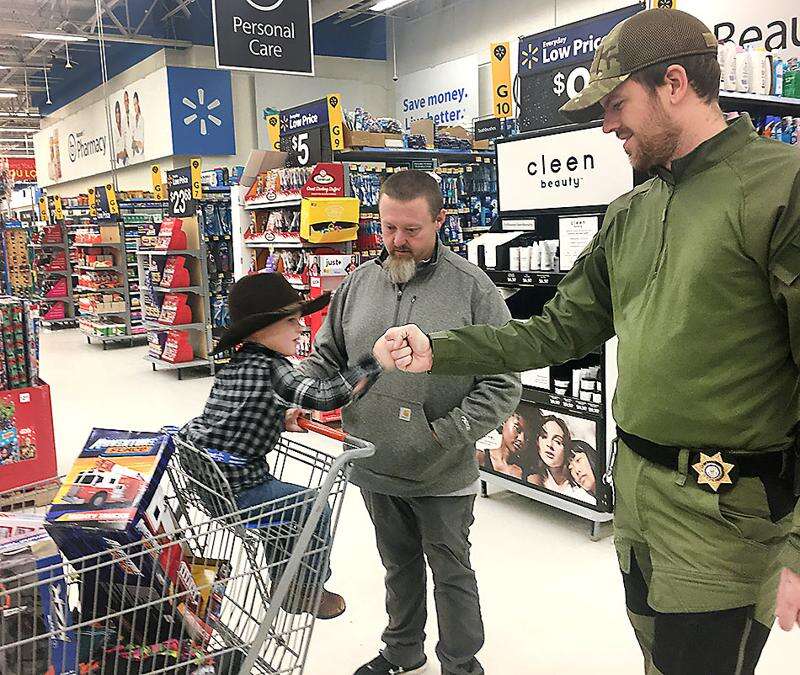 125 Durango-area children 'Shop with a Cop' at Walmart – The