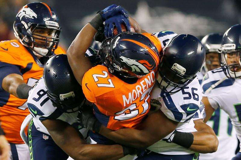 Seattle Seahawks wide receiver Jermaine Kearse (15) runs with the ball on  the way to a 23 yard touchdown against the Denver Broncos at the Super Bowl  XLVIII at MetLife Stadium in