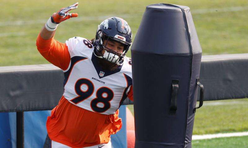 Mike Purcell's perseverance pays off with payday with Denver Broncos – The  Durango Herald