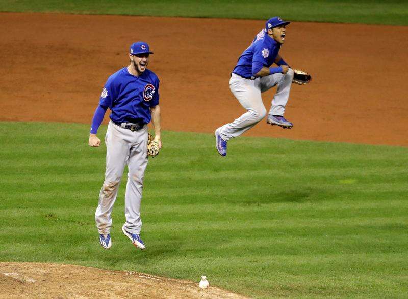 Chicago Cubs third baseman Kris Bryant (17), shortstop Javier Baez