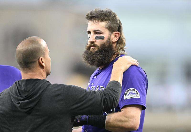 Rockies DH Blackmon leaves game vs. Padres after getting hit on left arm, left  eye by errant throw – The Journal