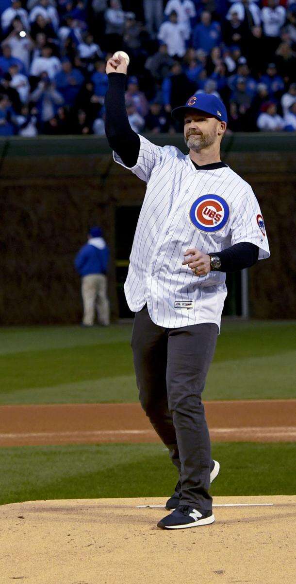 Chicago Cubs' Pitcher Jake Arrieta, gets his ring from Jimmy