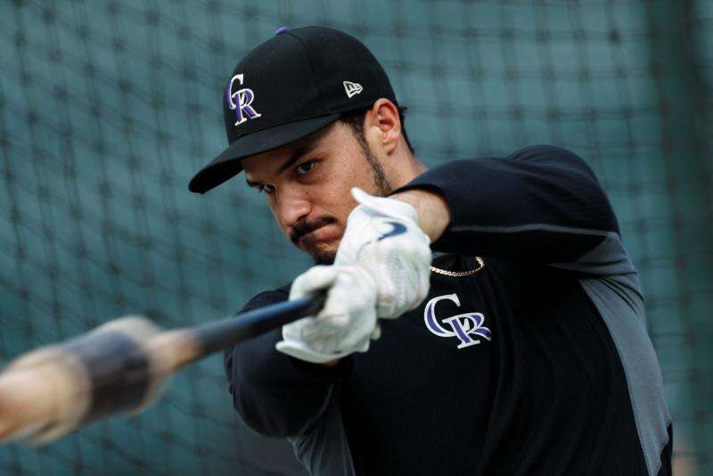 Nolan Arenado ready to get to work with Rockies _ for now