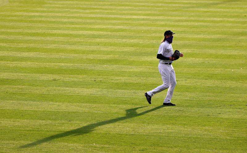 Colorado Rockies' Charlie Blackmon in action during the first baseball game  of a doubleheader against the Washington Nationals, Saturday, May 28, 2022,  in Washington. (AP Photo/Nick Wass Stock Photo - Alamy