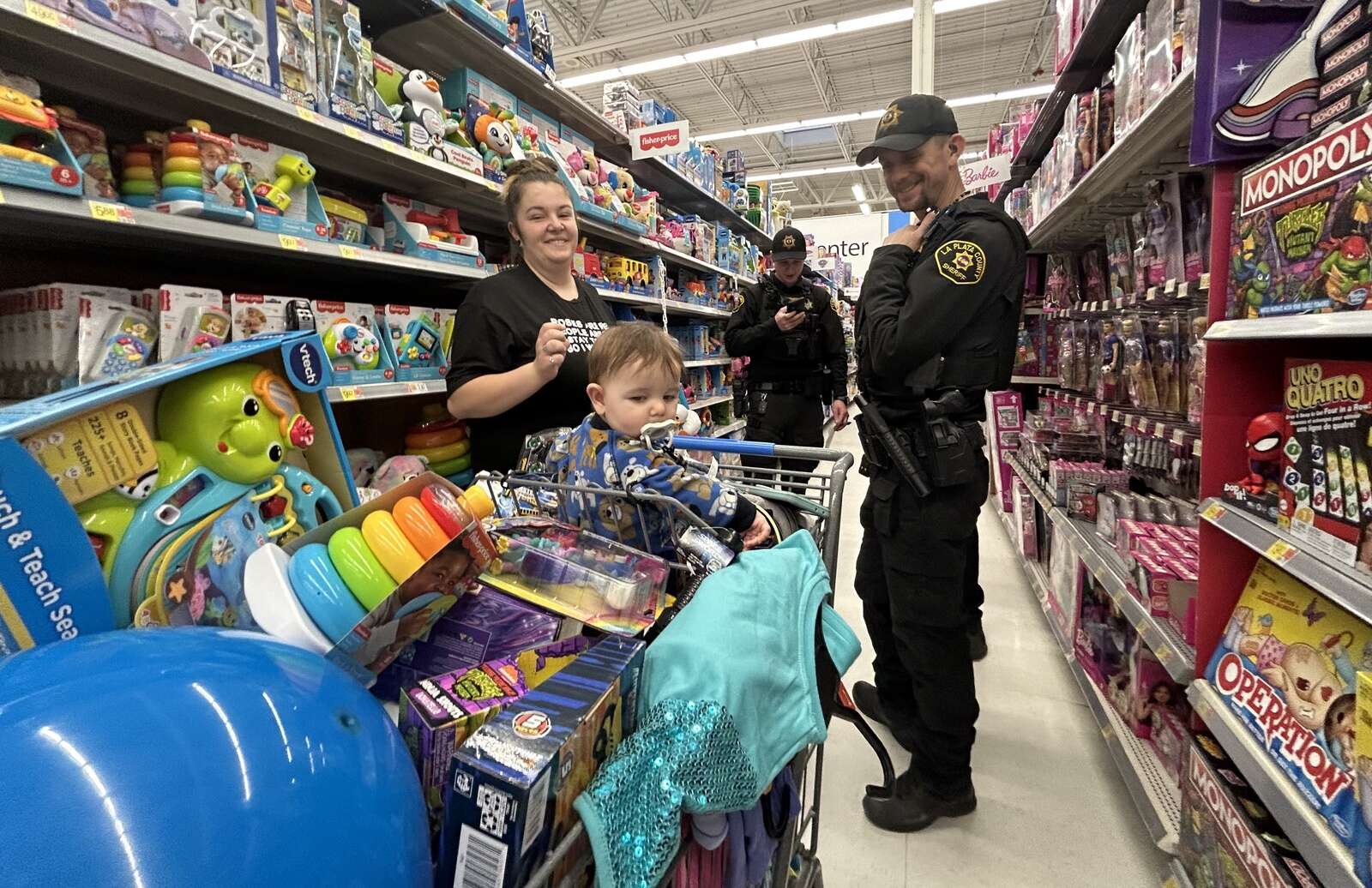 125 Durango-area children 'Shop with a Cop' at Walmart – The