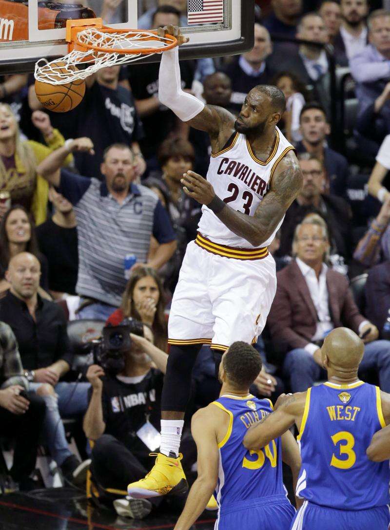 Basketball: James keeps coming in Cavs win