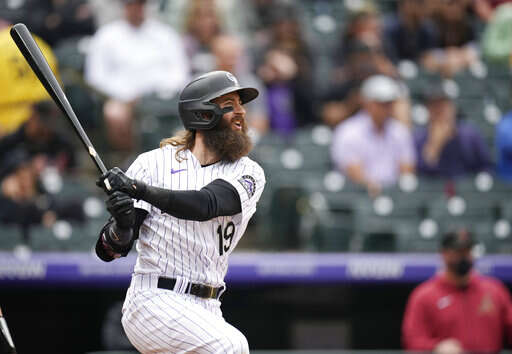 Charlie Blackmon wore ridiculous fishing waders at the Rockies' on-field  casting competition