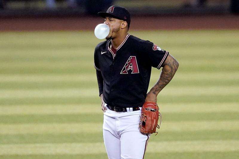 Daulton Varsho homers, Diamondbacks get rare win at Coors Field