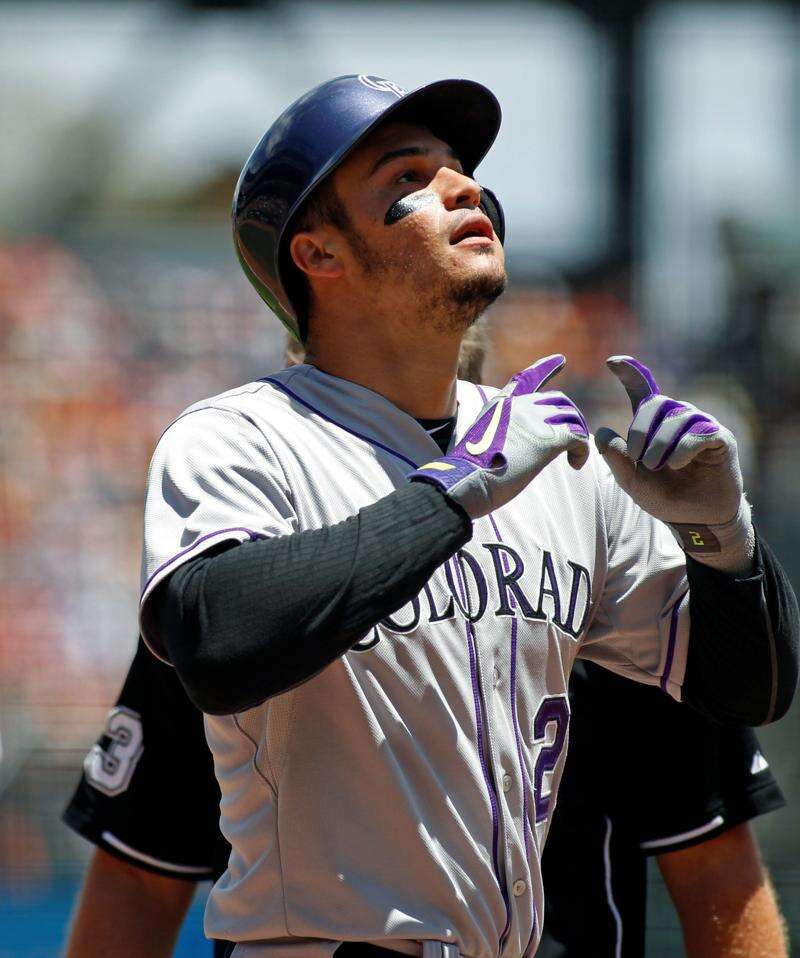 Arenado gets 2 hits in 1st game against Rockies