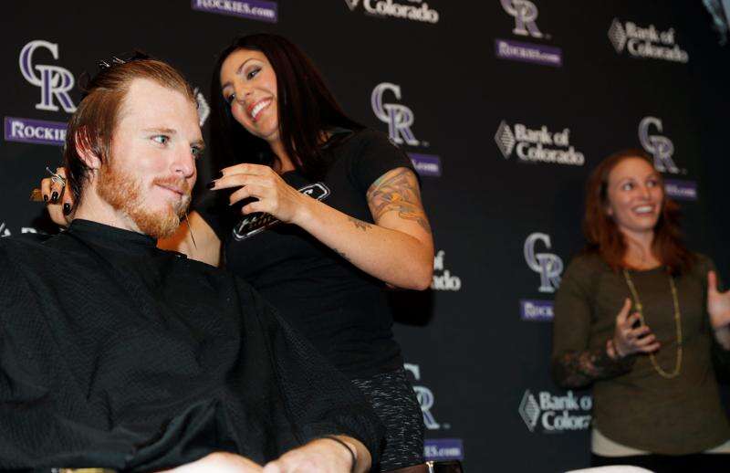 Rockies pitcher Jon Gray trims flowing locks for charity - ESPN