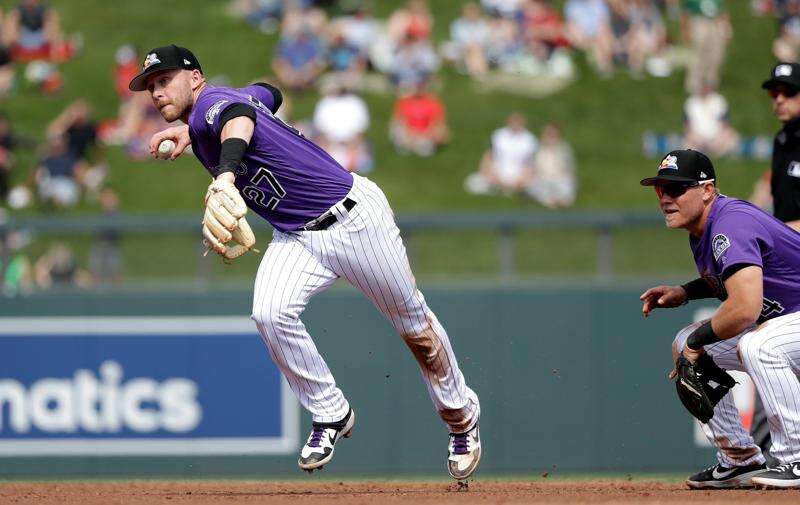 Colorado Rockies Trevor Story, Jon Gray and Mark Reynolds share