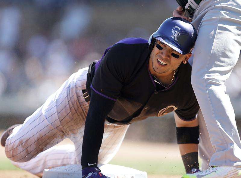 Carlos Gonzalez leaves Rockies spring training game with injury