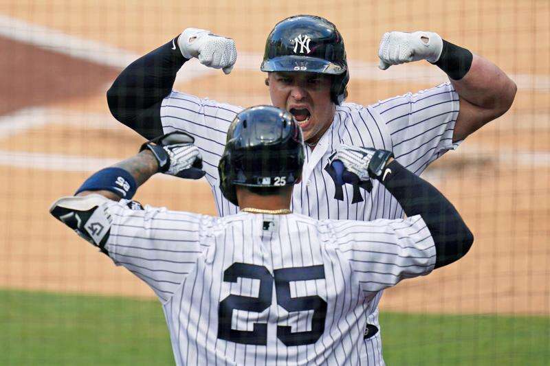 Stanton, Yankees power way to 9-3 win against Rays in opener