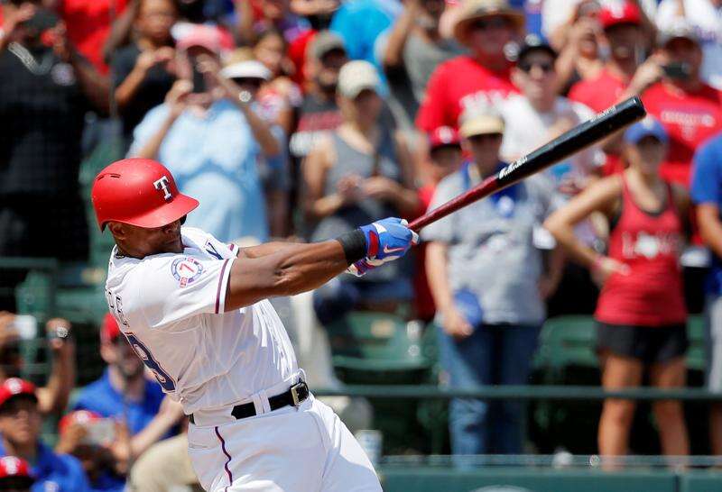 Texas Rangers' Adrian Beltre follows through on a double to right