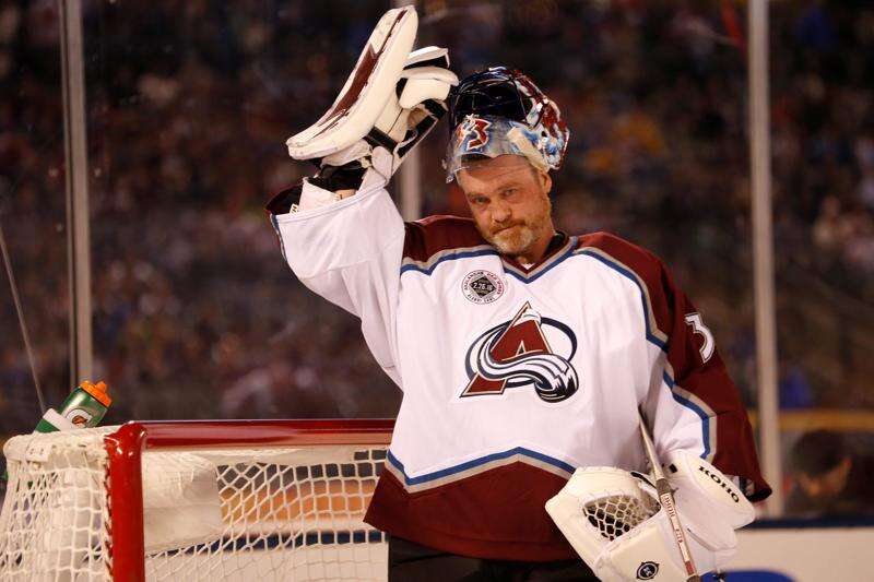 Goalie Patrick Roy of the Colorado Avalanche warms up prior to