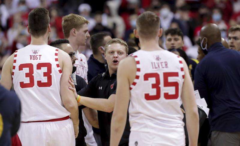 College basketball fight michigan