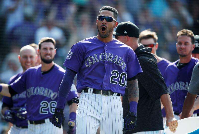 Colorado Rockies 1B Ian Desmond fractures hand 