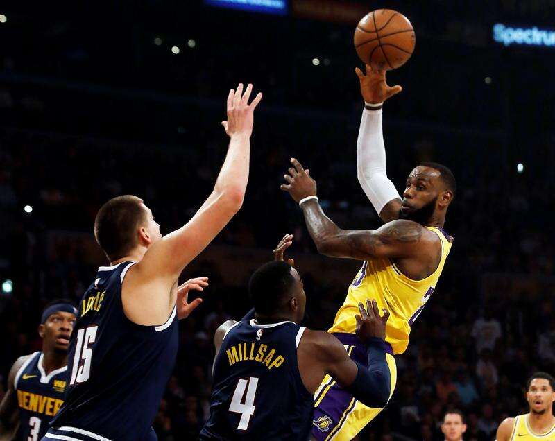 Nikola Jokic's triple-double leads Nuggets' late rally past Lakers in Game 2  