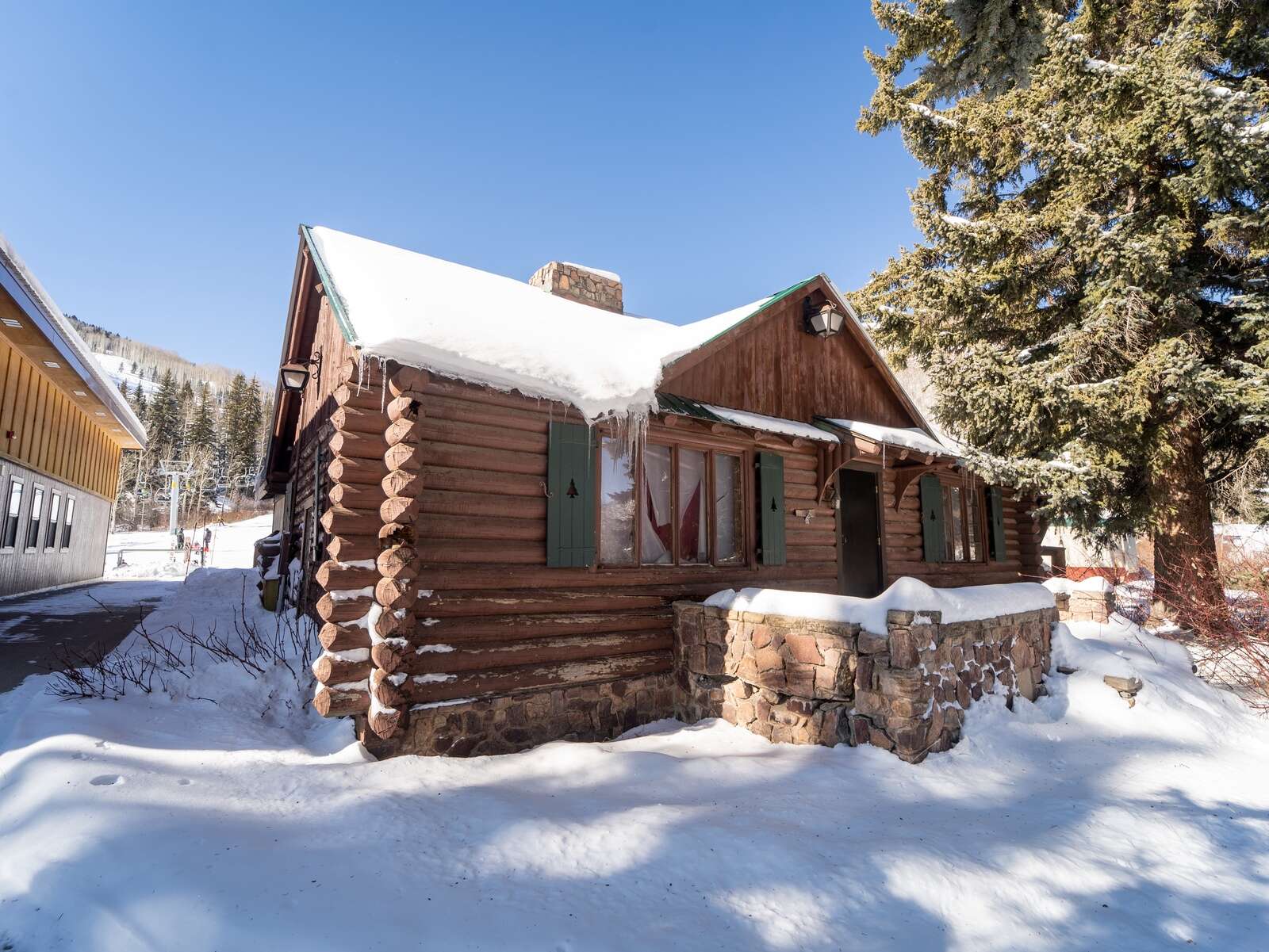 log cabin in the snowy mountains