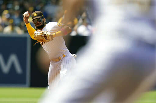 San Diego Padres right fielder Fernando Tatis Jr (23) gets hit by a pitch  during an MLB regular season game against the Colorado Rockies, Wednesday,  A Stock Photo - Alamy