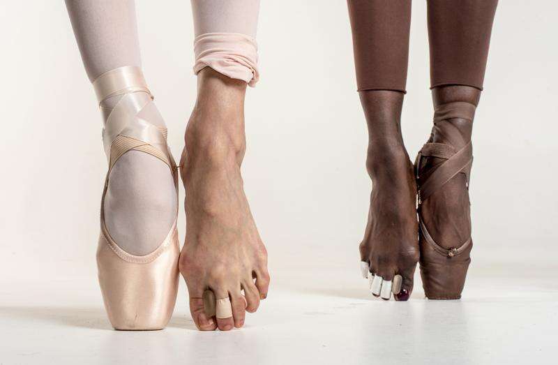 ballet dancers on pointe feet