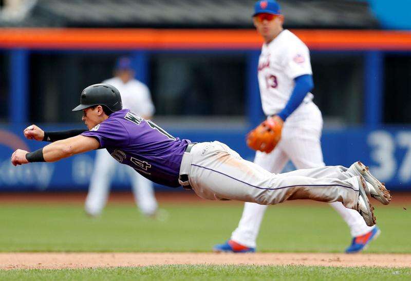 Rockies' Ian Desmond takes first swings