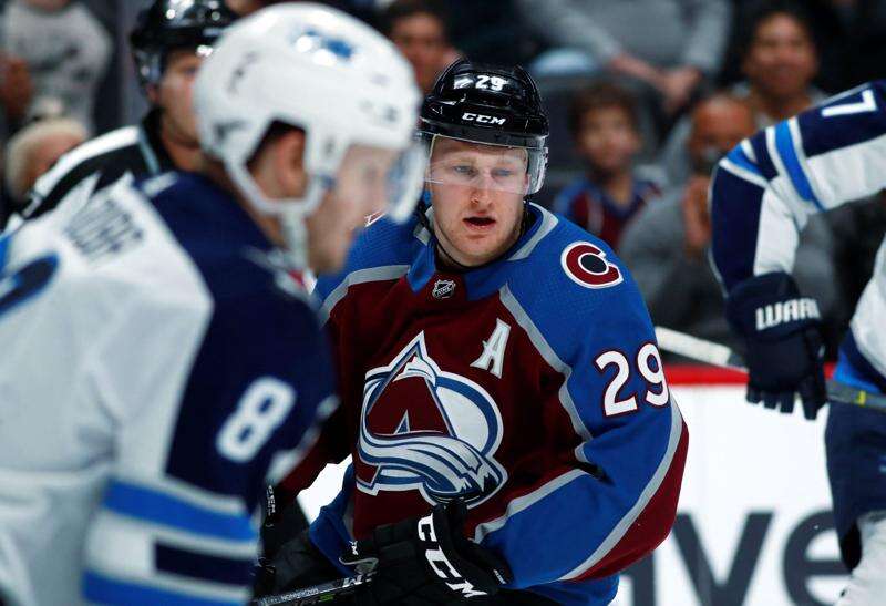 Nathan MacKinnon fined $5,000 for helmet toss to rival's face