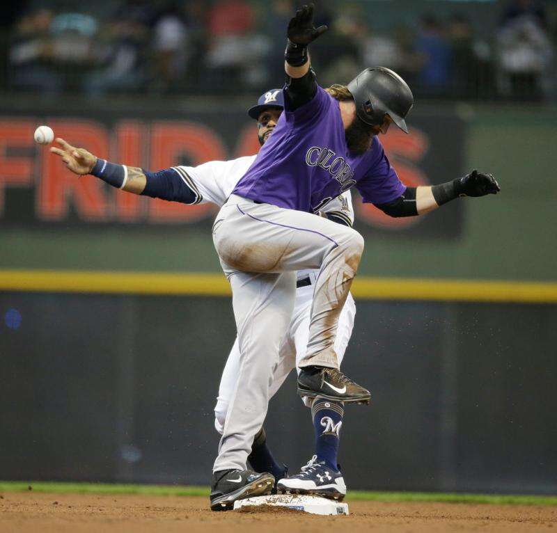 Charlie Blackmon makes first defensive start of spring, Rockies lose