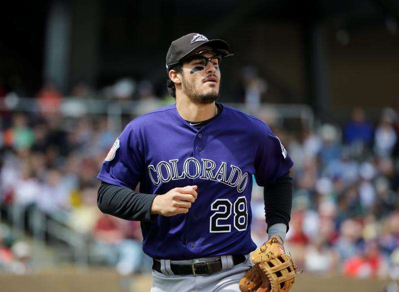 Rockies raise outfield walls at Coors Field in two spots