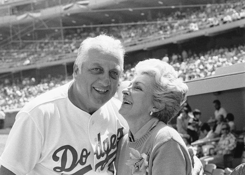 In this March 31, 2011, photo, former Los Angeles Dodgers manager Tommy  Lasorda, right, stands with former pitcher Fernando Valenzuela before a  baseball game at Dodger Stadium in Los Angeles. Lasorda, the