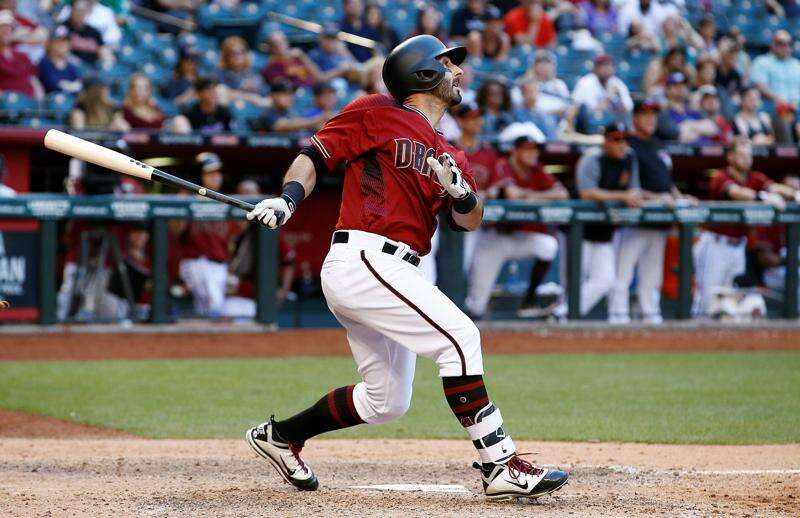 Daniel Descalso of the Arizona Diamondbacks hits a two run home