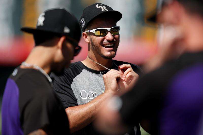 Rockies' Nolan Arenado, dealing with sore left shoulder, sits – The Fort  Morgan Times