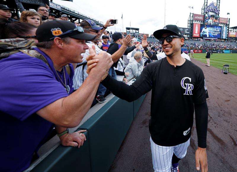 The Colorado Rockies gave mullet caps to fans