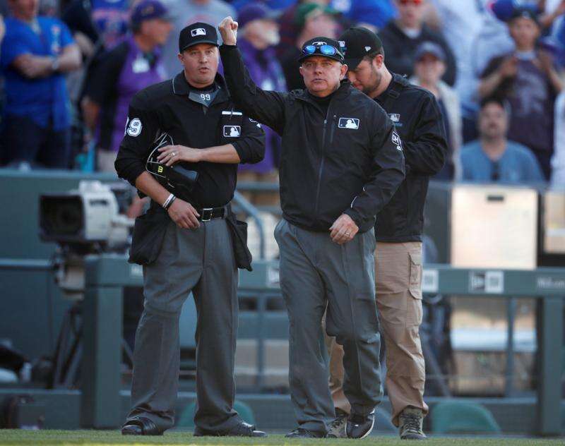 Arenado out at plate in game-ending replay reversal