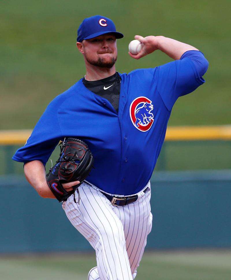 Jon Lester strikes out 10, homers for Chicago Cubs in win over Colorado  Rockies – The Durango Herald