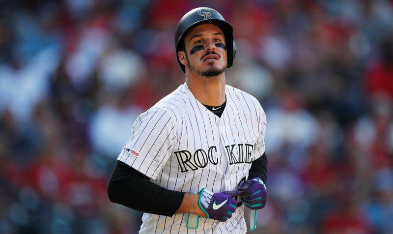 Nolan Arenado ready to get to work with Rockies _ for now