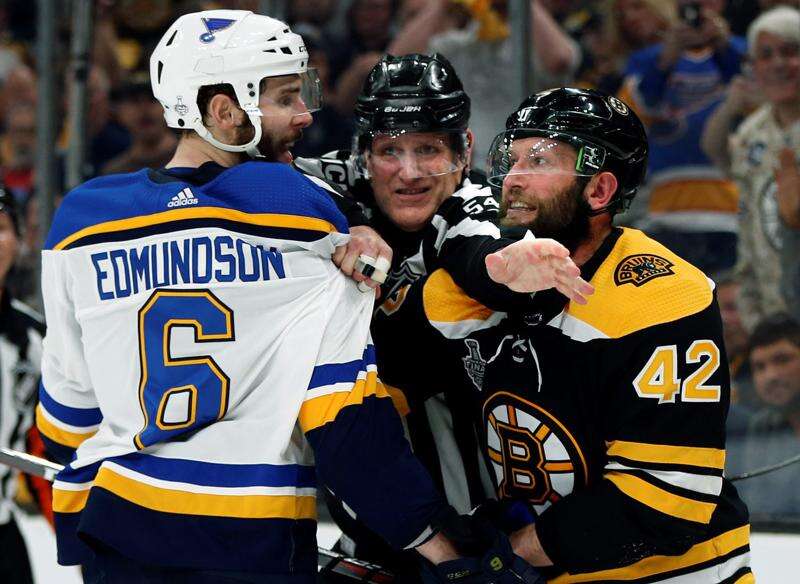 NHL playoffs 2019: Bruins defenseman Torey Krug helped off ice after hard  hit into boards