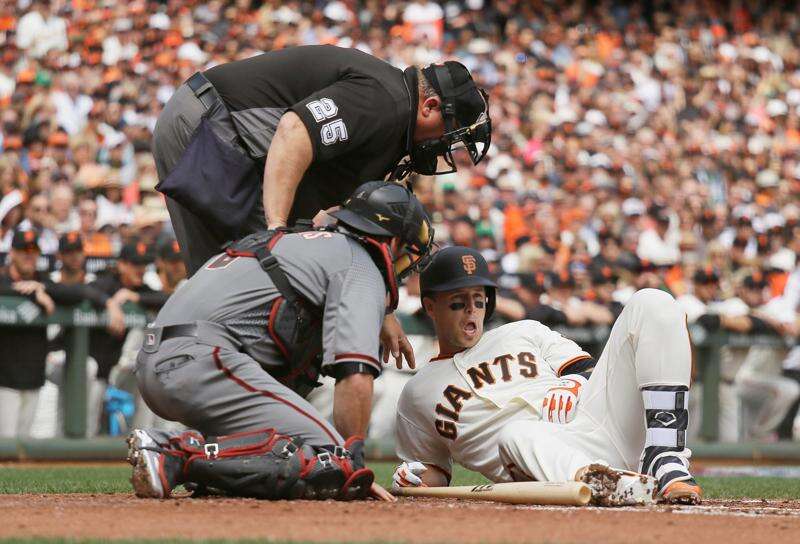 Plate ump leaves A's-Angels game after getting hit twice