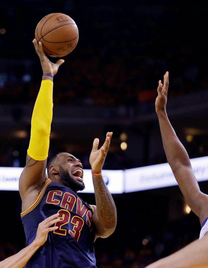LeBron James, Cavaliers beat Warriors in Game 2 OT to even NBA