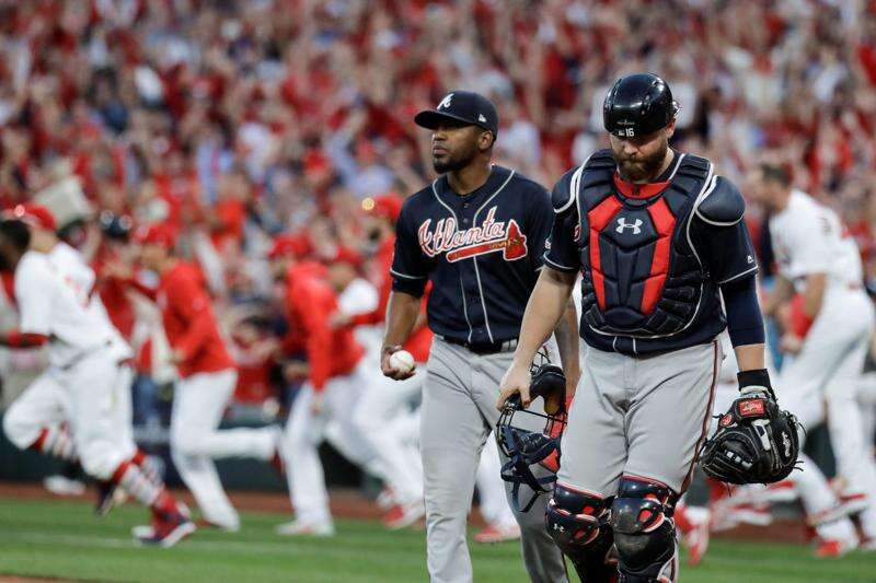 Yadier Molina responds to Ronald Acuna with throat slash after winning game