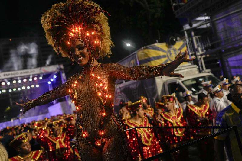 AP PHOTOS: A Carnival day in Brazil, from a morning street party