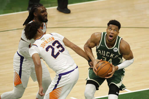 Milwaukee Bucks forward Giannis Antetokounmpo greets forward Thanasis  Antetokounmpo (43) following the game against the Miami Heat following game  two of the 2023 NBA Playoffs at Fiserv Forum.